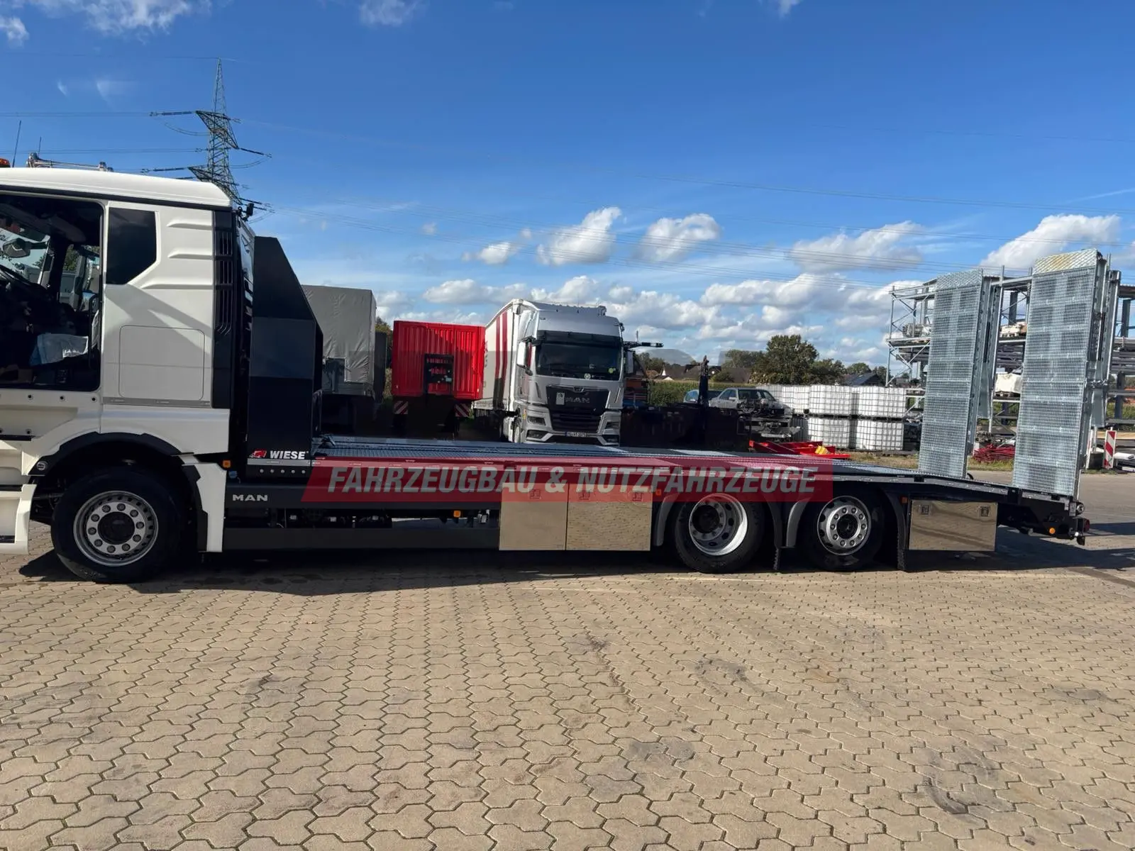 MAN Baumaschinen-  Arbeitsbühnentransporter Rampen