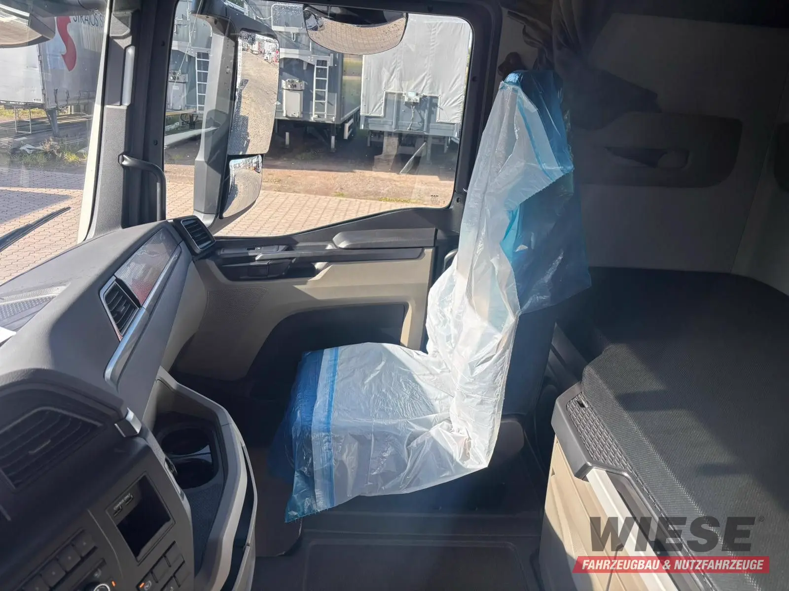 MAN Baumaschinen-  Arbeitsbühnentransporter Rampen