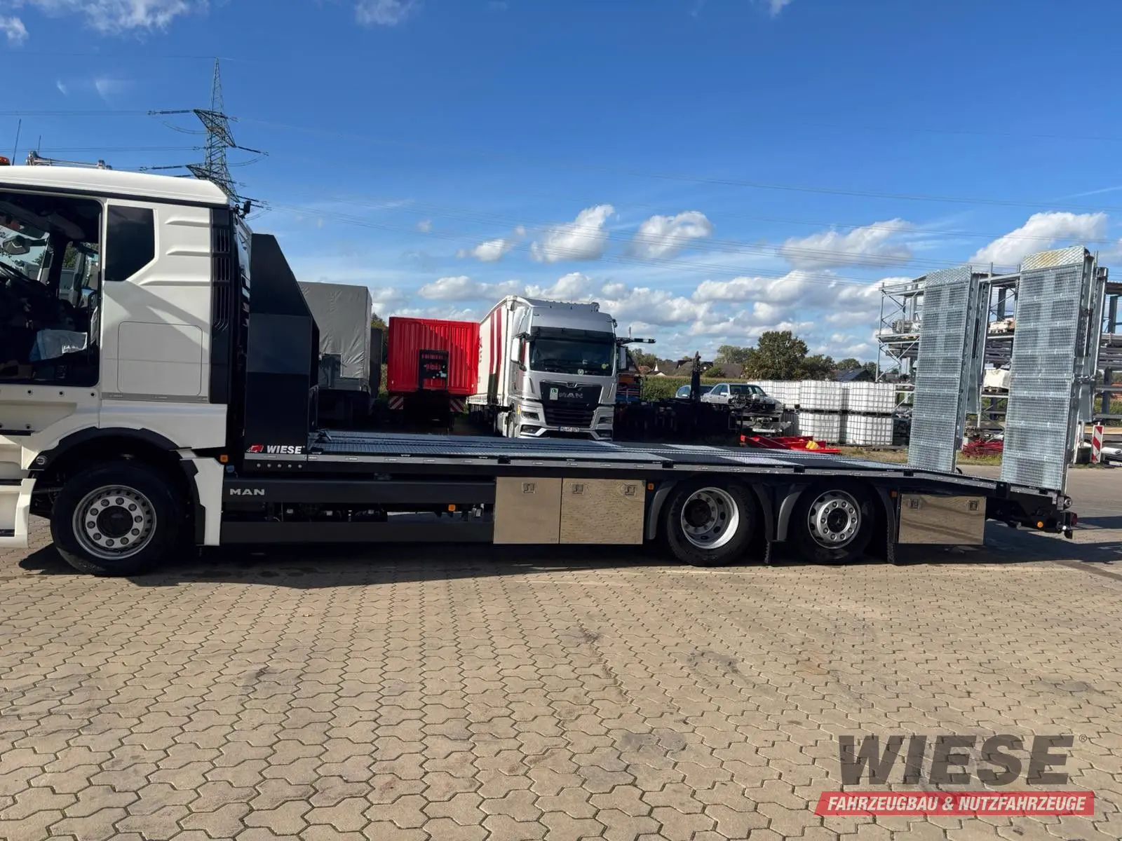 MAN Baumaschinen-  Arbeitsbühnentransporter Rampen