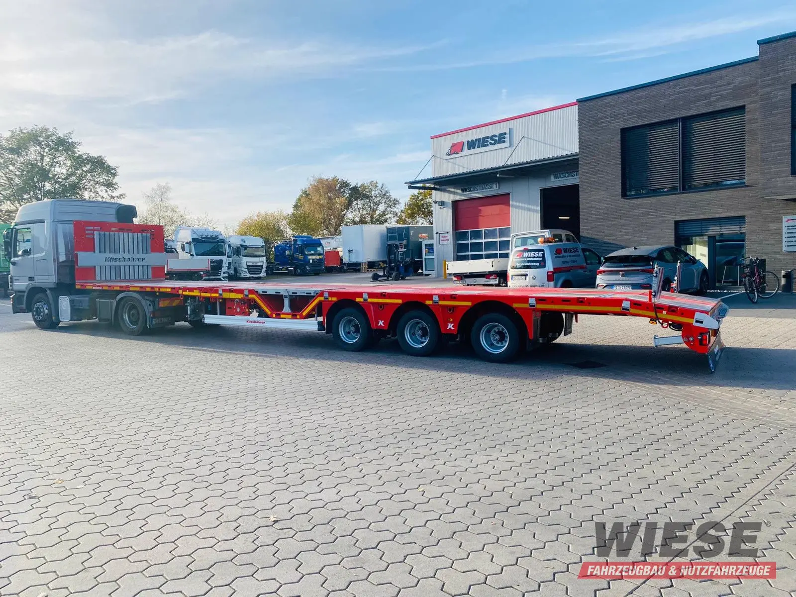 Kässbohrer Mega Tele HD Plattform Auflieger mit Radmulden