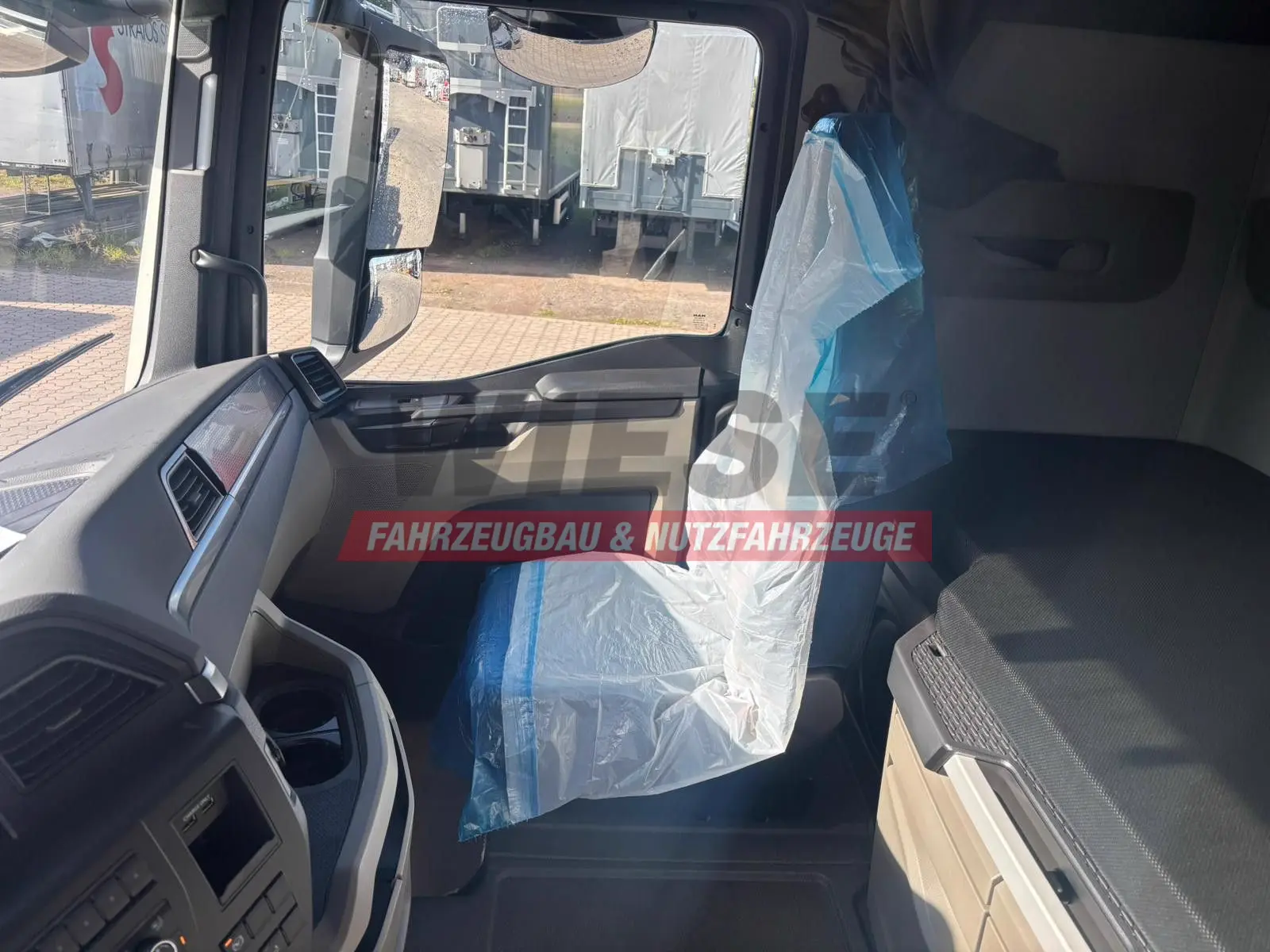 MAN Baumaschinen-  Arbeitsbühnentransporter Rampen