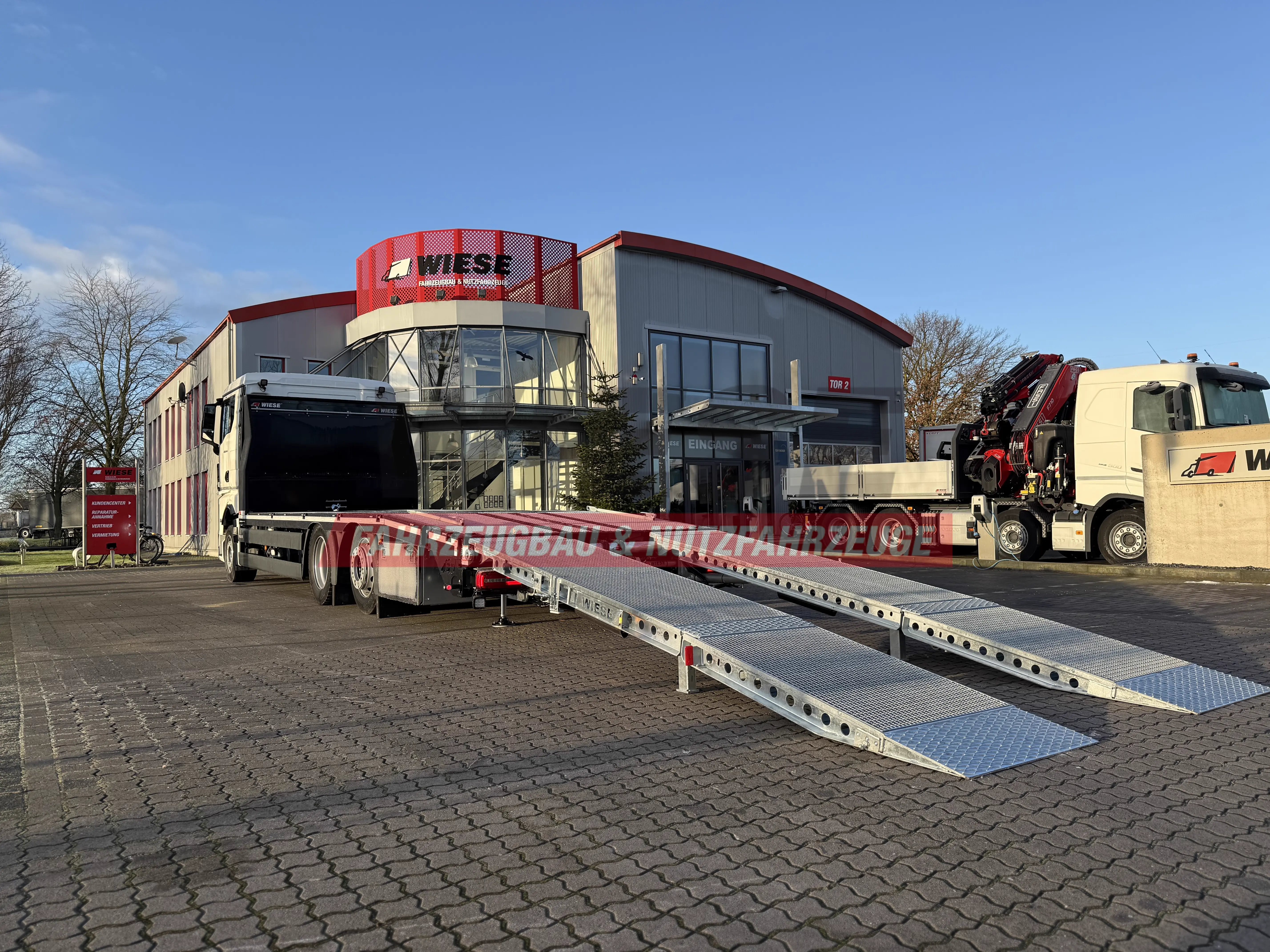 MAN Baumaschinen- Arbeitsbühnentransporter Rampen